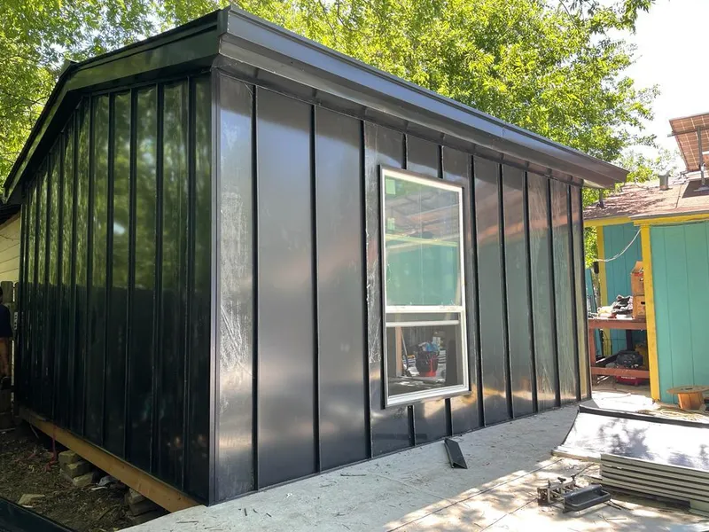 Black standing seam metal wall panels for Metal Roof Installation in Sylvester