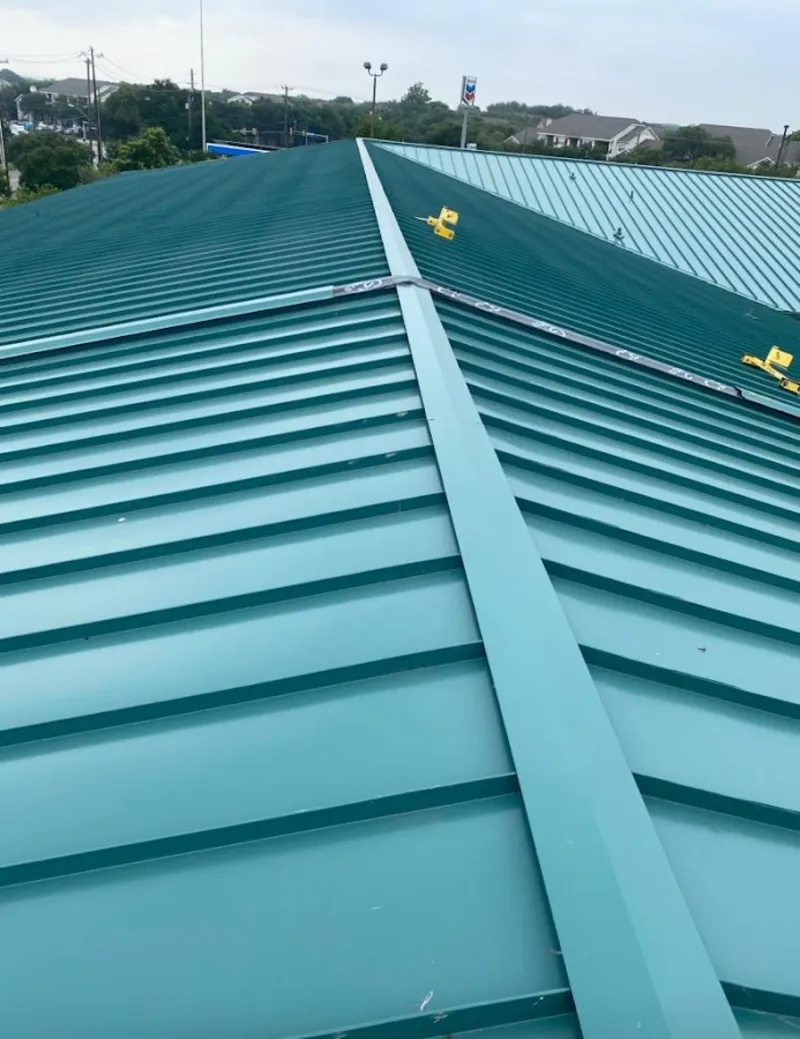 Green commercial metal roof ridge and valley for Metal Roof Repair in Sylvester